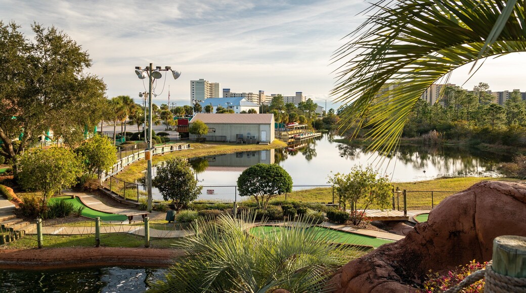 Adventure Island featuring a river or creek and a garden