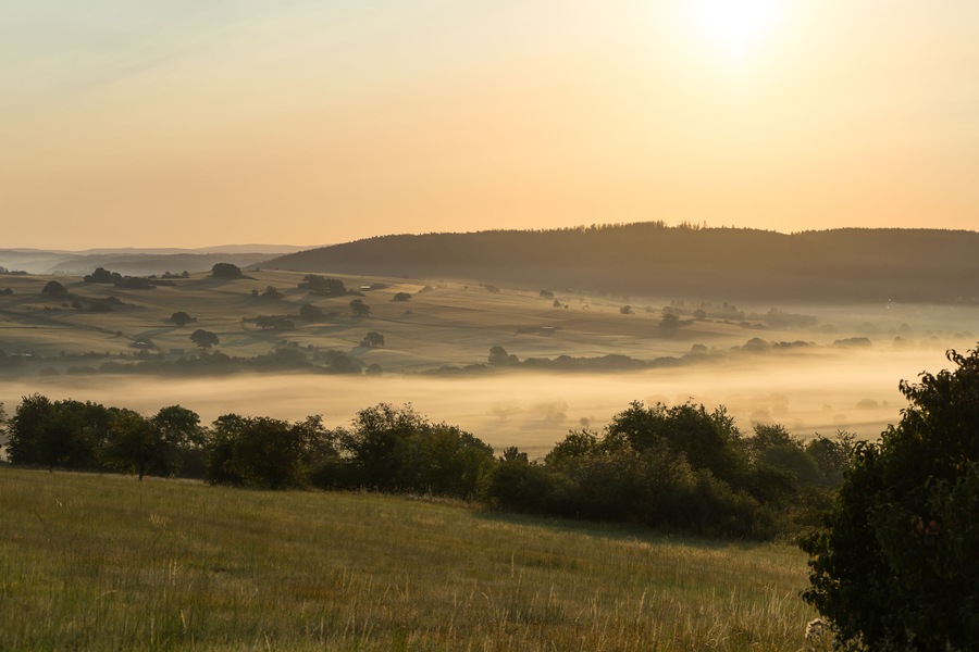 Sunrise with fog at the german Rothaargebirge