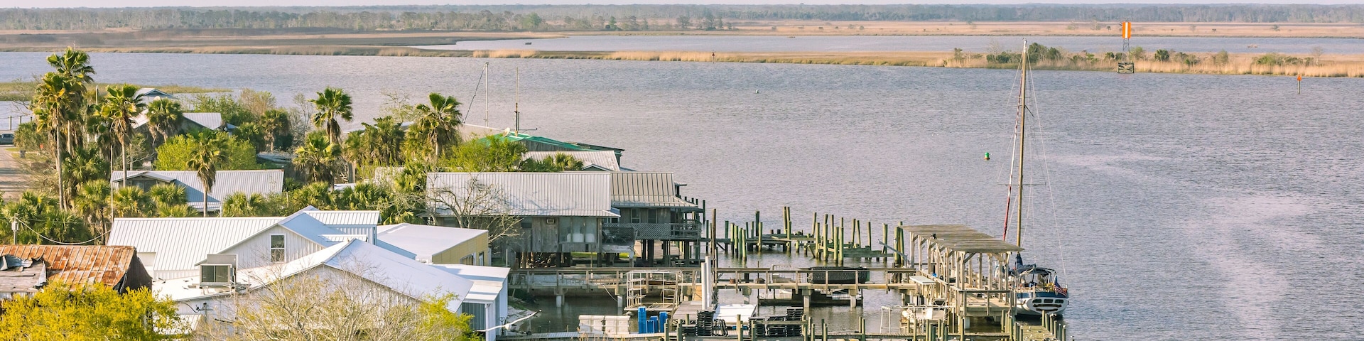A view of Apalachicola, Florida from the bridge on a sunny day.