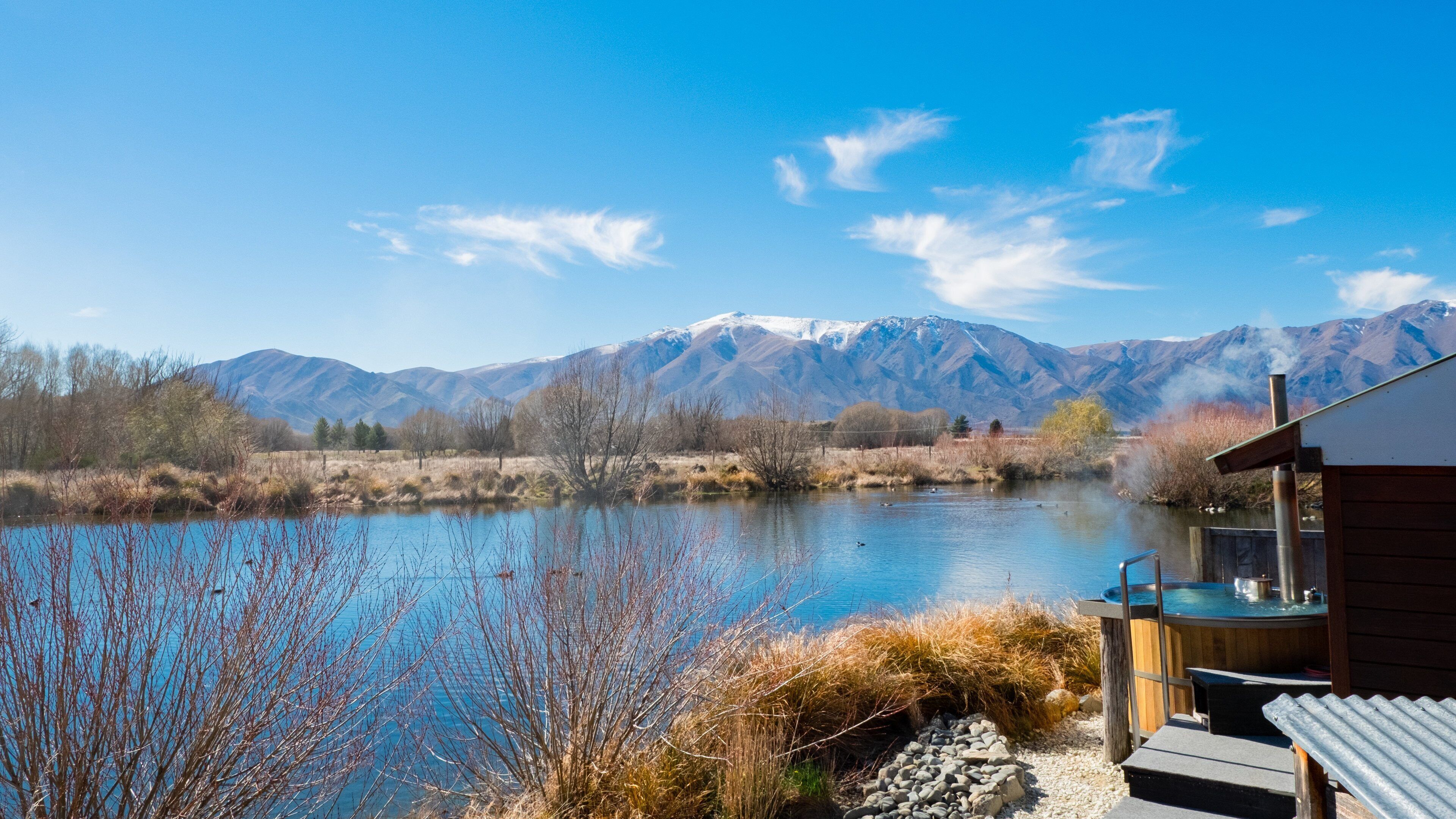 Hot Tubs Omarama which includes a lake or waterhole and a pool