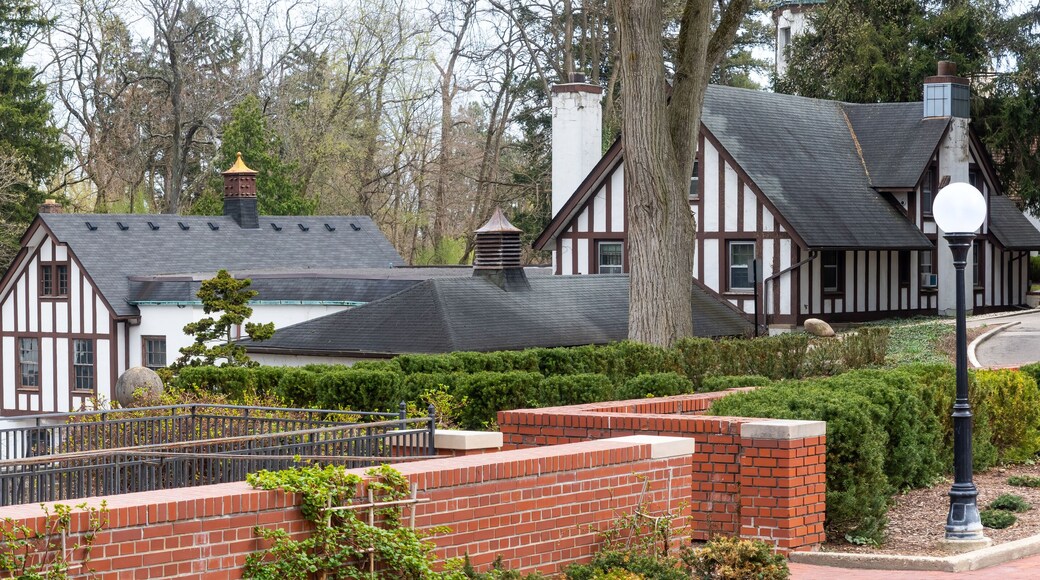 Panoramic view of historic buildings in Cranbrook house and gardens in Michigan.