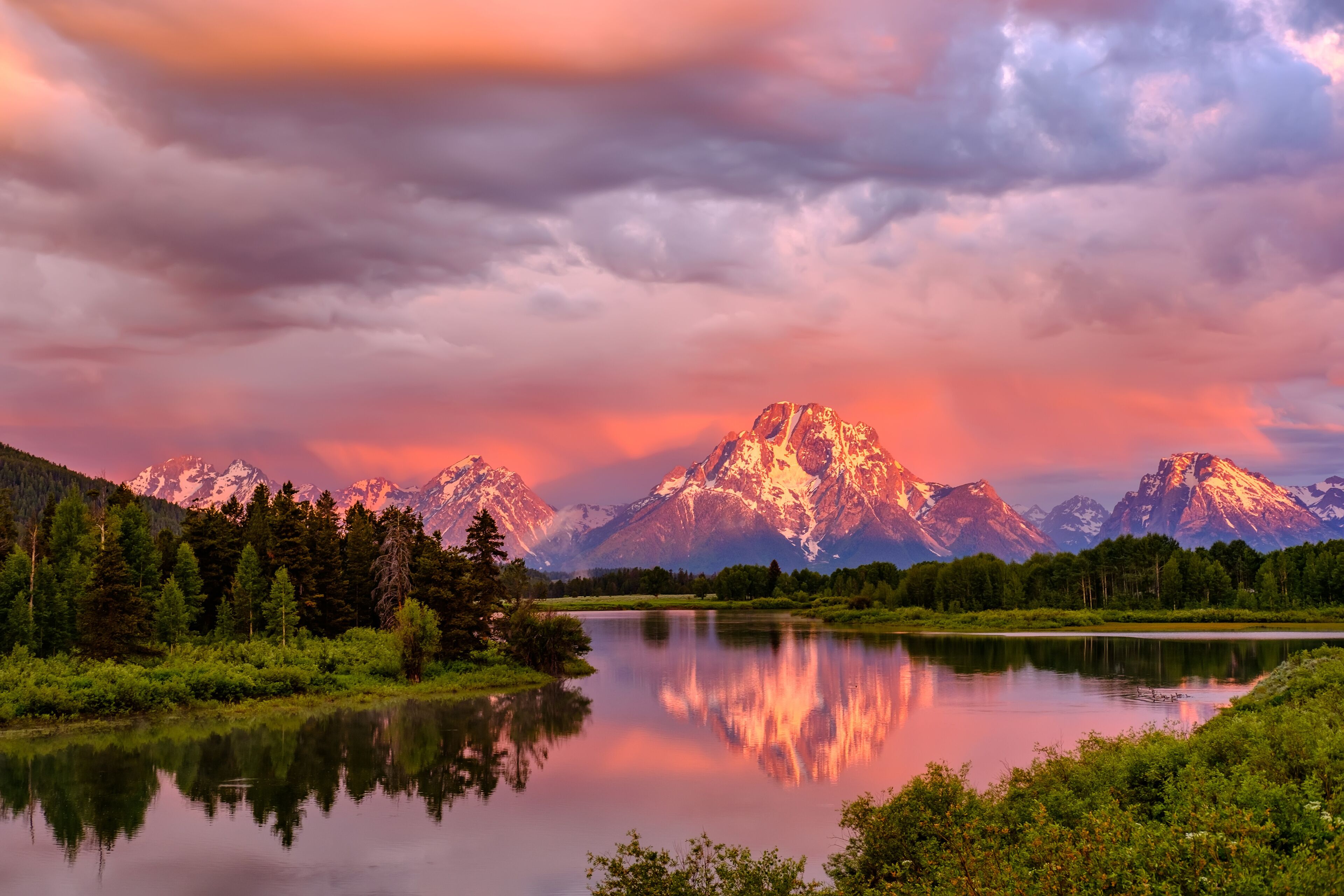 Mountains in Grand Teton National Park at sunrise. Oxbow Bend on the Snake River.