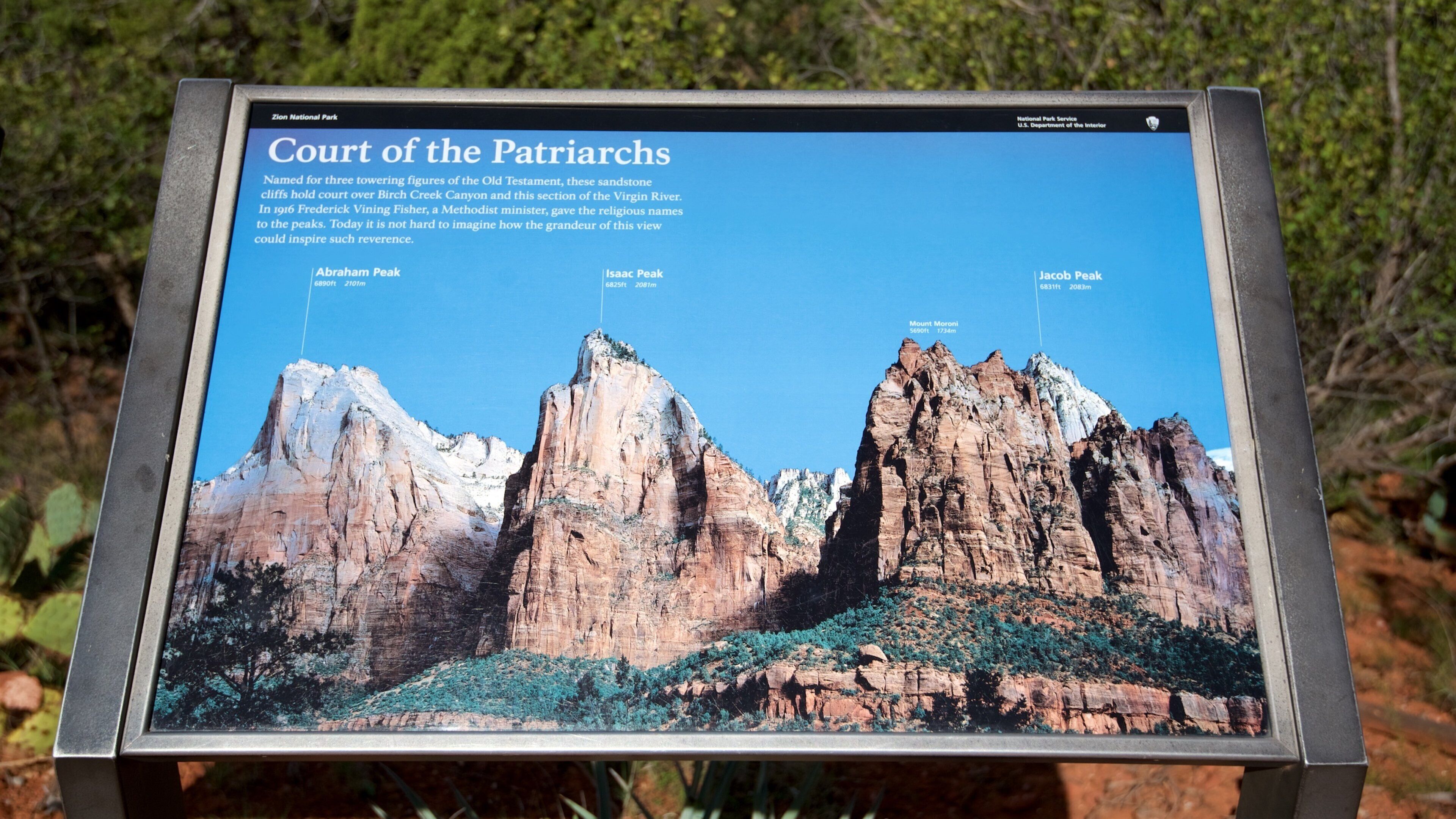 Court of the Patriarchs Viewpoint showing signage and hiking or walking