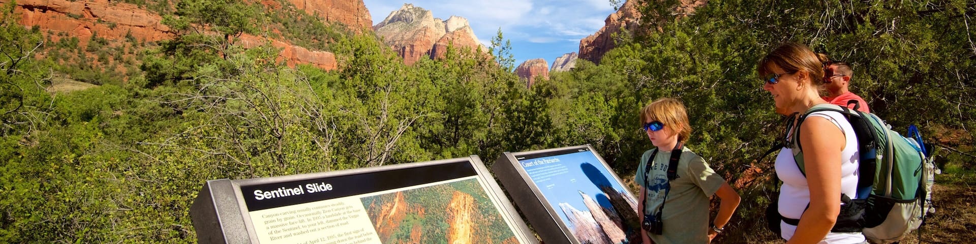 Court of the Patriarchs Viewpoint featuring hiking or walking, mountains and signage