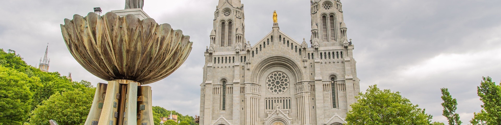 Basilica of Sainte-Anne-de-Beaupré featuring heritage architecture, a church or cathedral and heritage elements