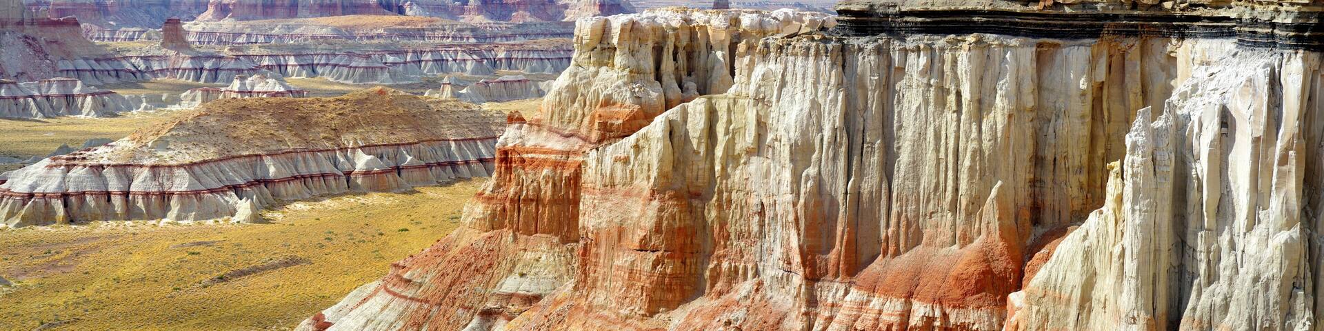 Stunning view of white striped sandstone hoodoos in Coal Mine Canyon near Tuba city, Arizona, USA.