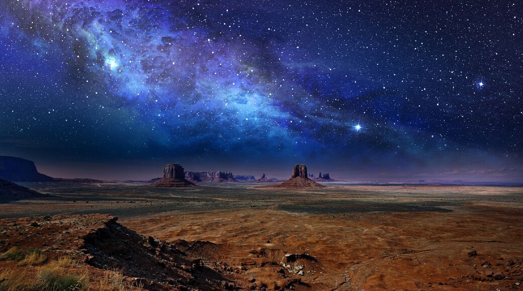 starry night sky over the monument valley