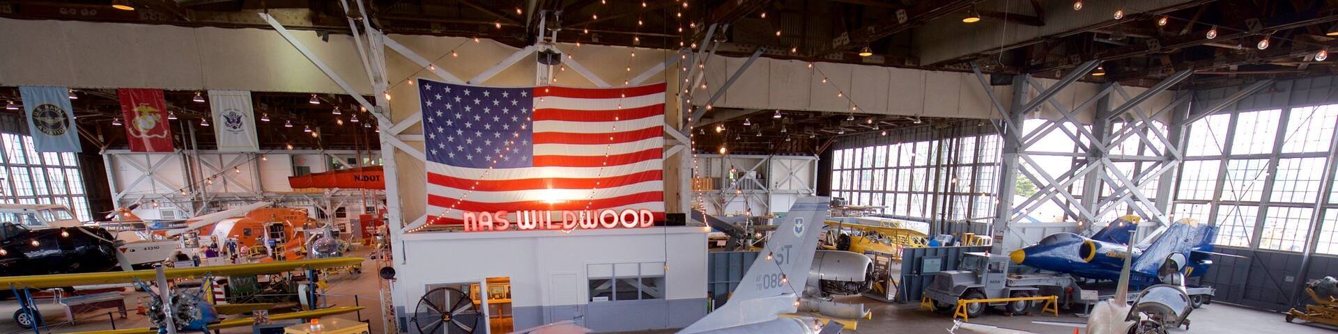 Naval Air Station Wildwood Aviation Museum which includes military items and interior views