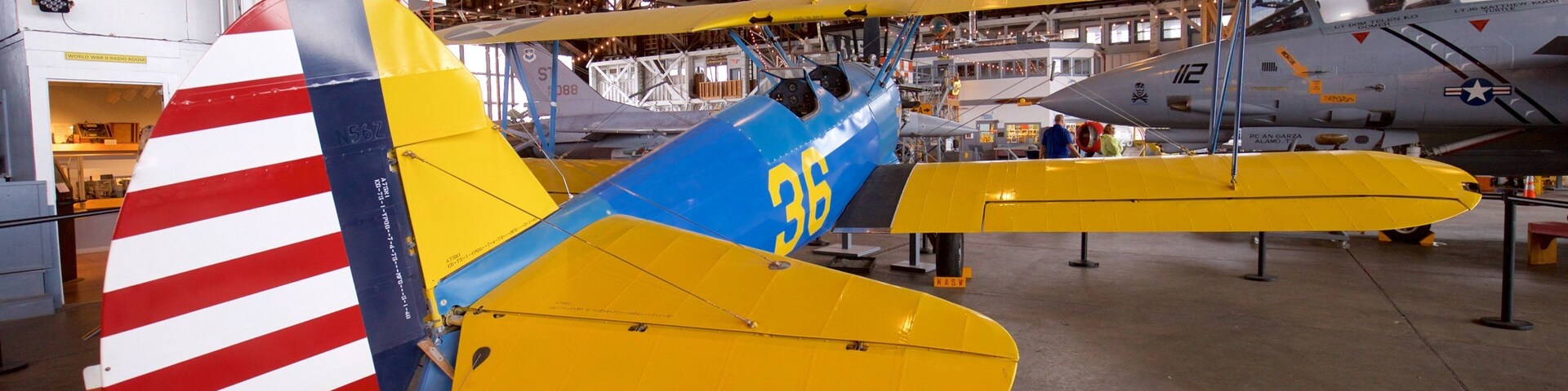 Naval Air Station Wildwood Aviation Museum which includes interior views, military items and heritage elements