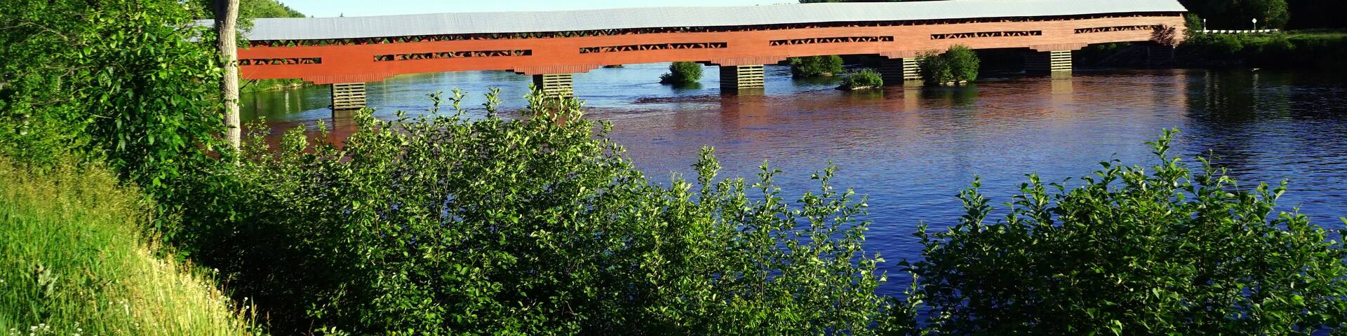 Red covered bridge across the Coulonge River in western Quebec
