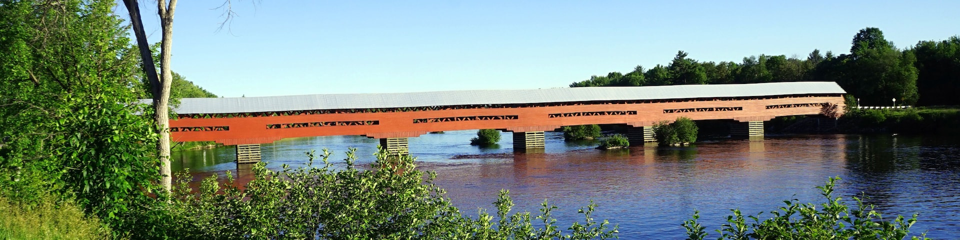 Red covered bridge across the Coulonge River in western Quebec