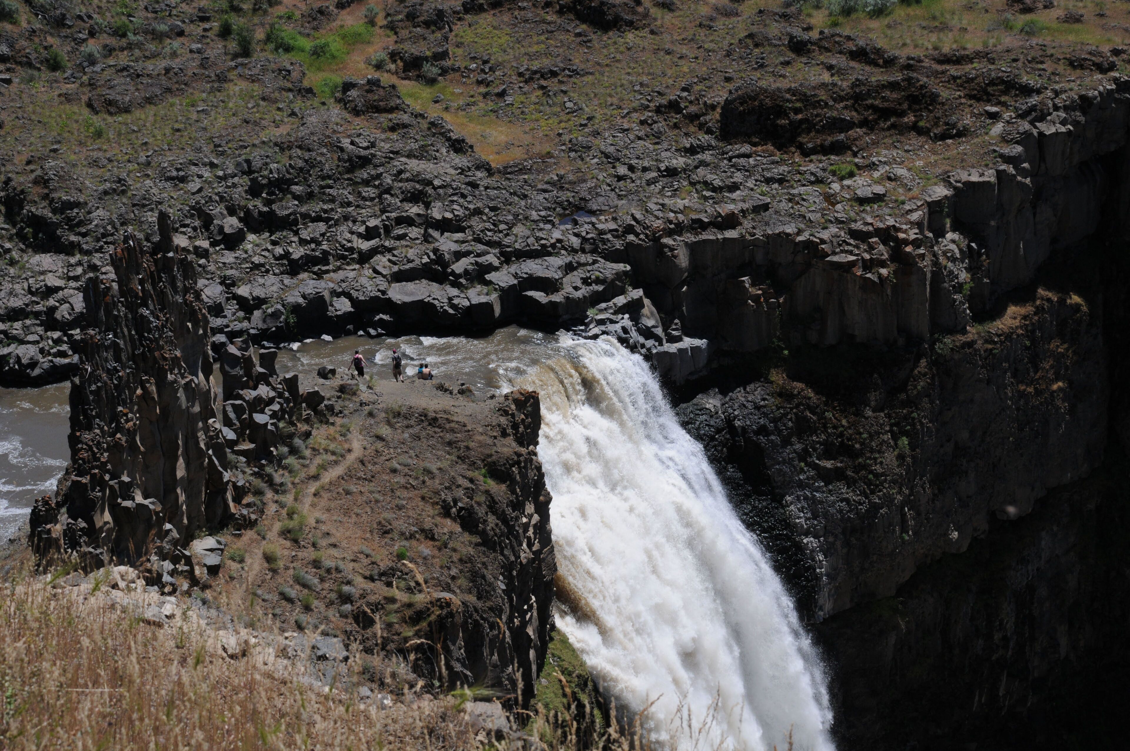Palouse Falls is spectacular in the spring when the runoff is strong.  Fine views are available from the main frontal viewing area, but for the more adventurous, taking the trails can offer some real thrills.  Beware, the crumbly rock makes hiking treacherous, and there are rattlesnakes to increase the degree of difficulty.
#waterfalls
#washington_channeled_scablands
#state_parks
#Nature