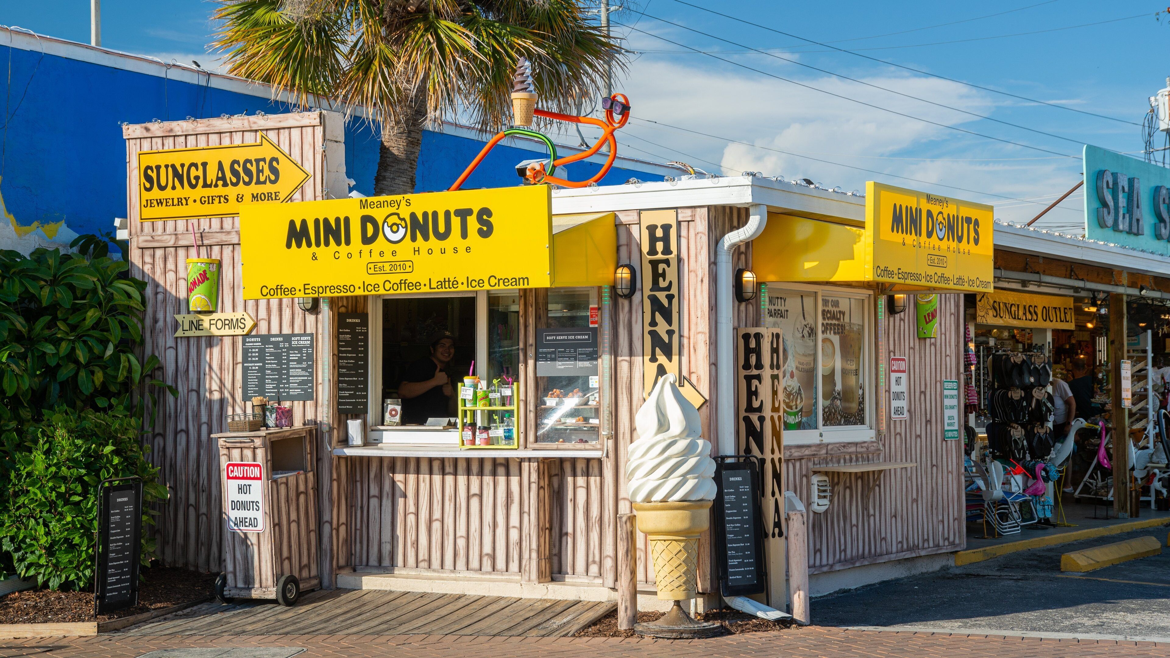 Meaney's Mini Donuts & Coffee House walk-up kiosk in Siesta Key Village.