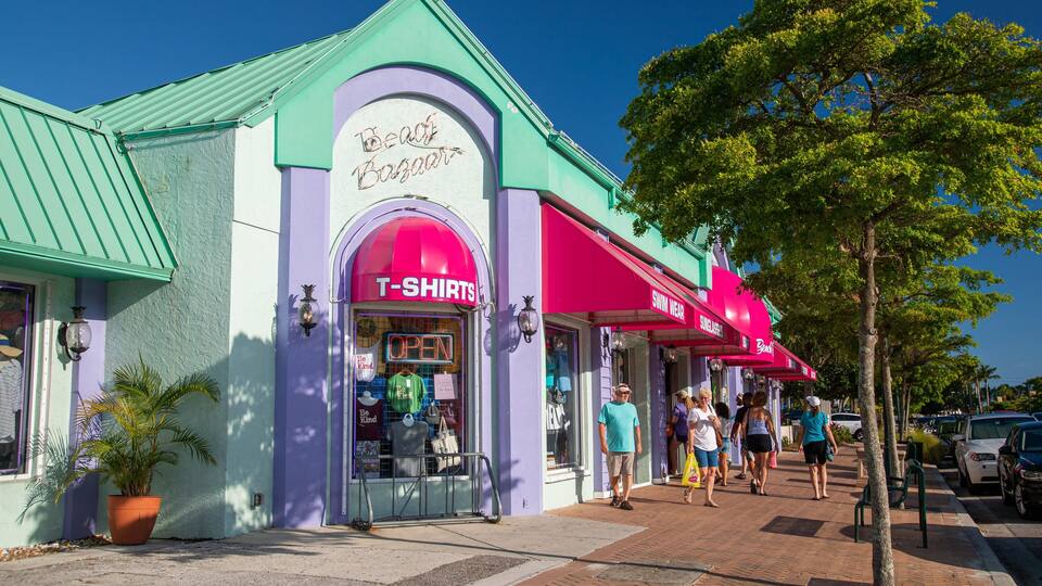 A colorful storefront with a T-shirts section and a swimwear section.