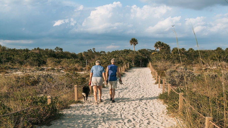 Bowman\'s Beach featuring a beach as well as a couple