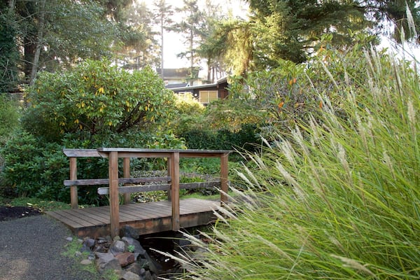 Connie Hansen Garden featuring a bridge and a garden