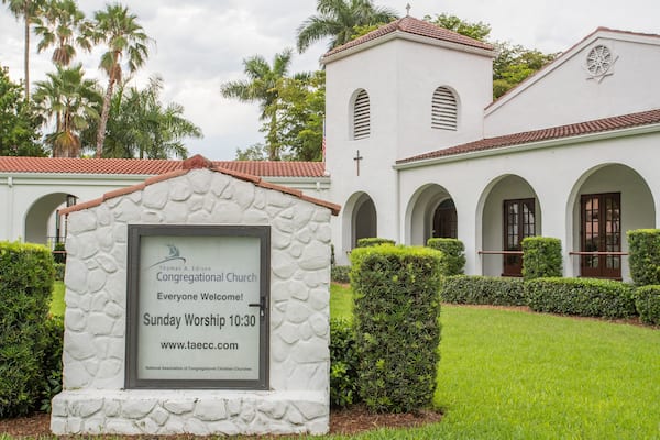 Thomas Edison Congregational Church featuring signage and a church or cathedral