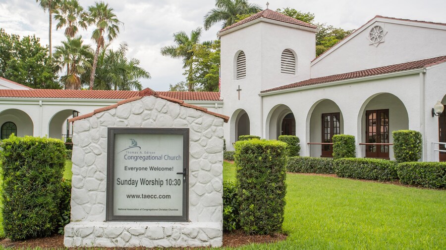 Thomas Edison Congregational Church featuring signage and a church or cathedral