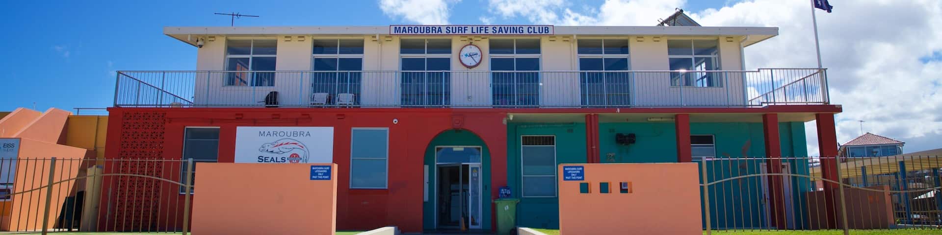 A building with a sign reading "Maroubra Surf Life Saving Club".