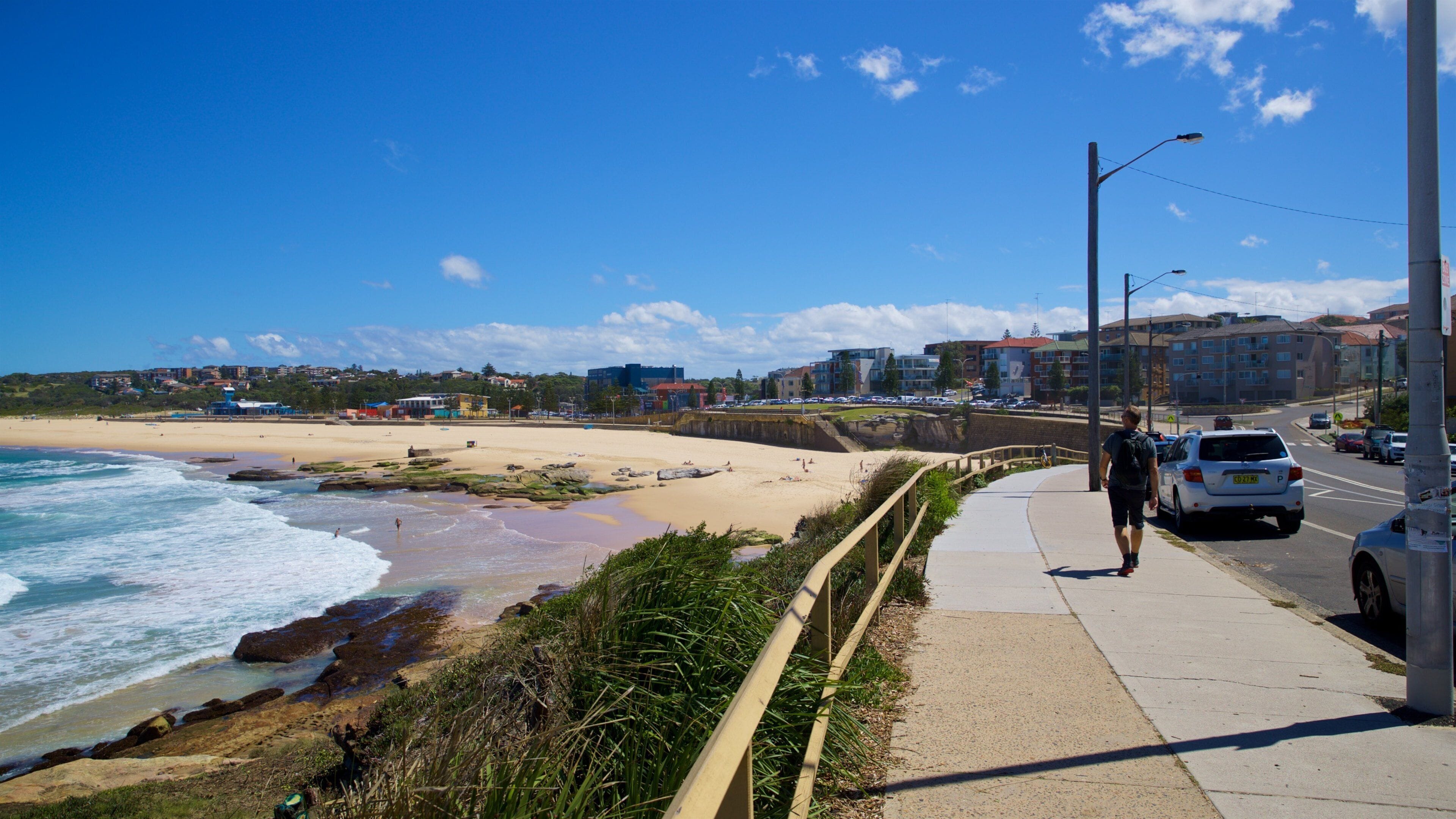 Maroubra Beach showing general coastal views and a coastal town as well as an individual male