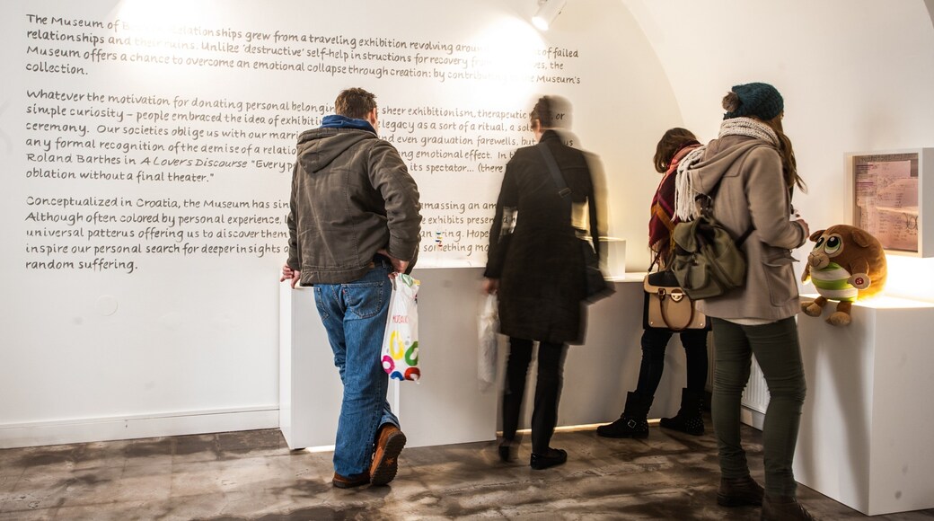Museum of Broken Relationships showing interior views as well as a small group of people