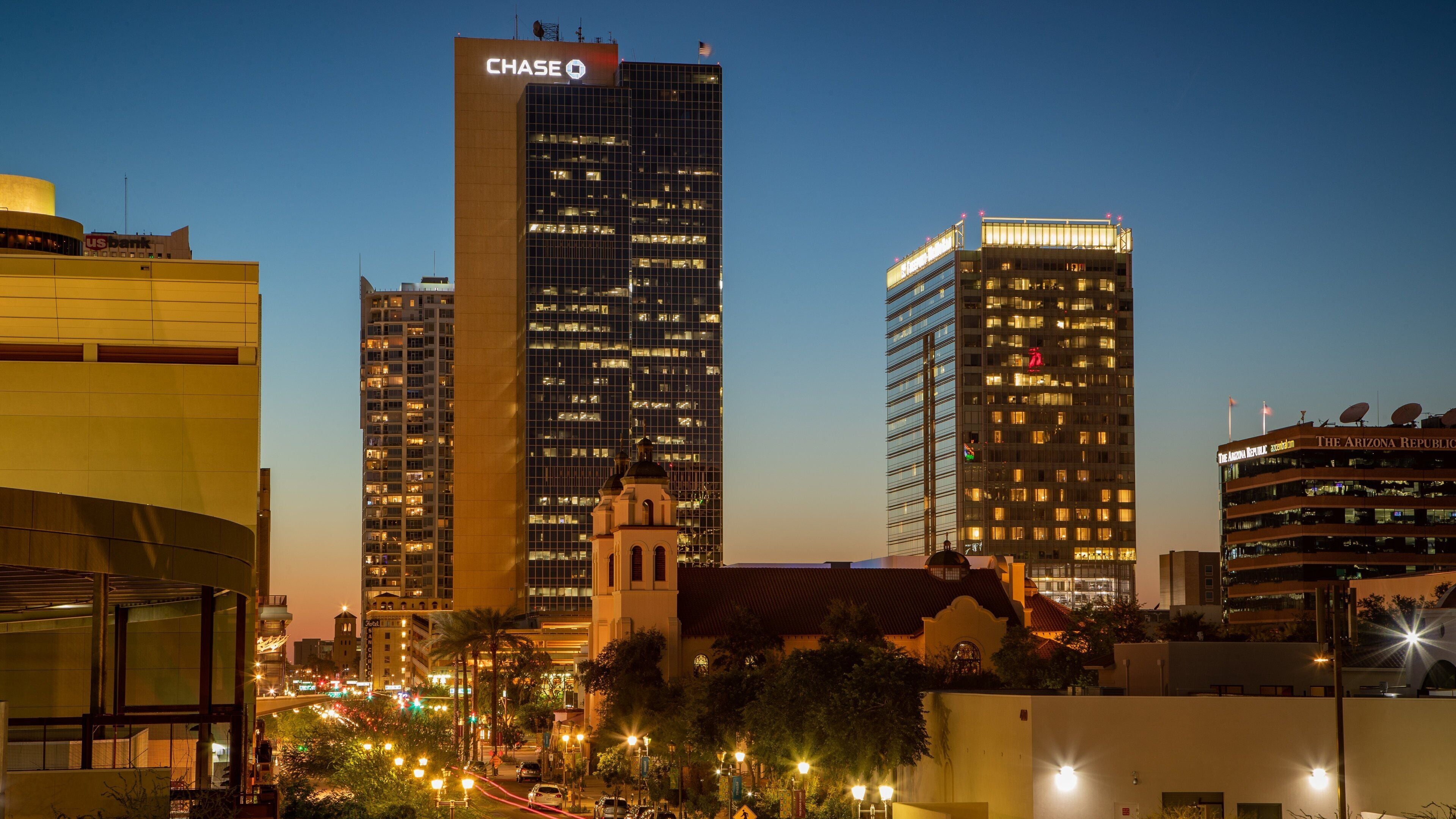 Downtown Phoenix which includes a sunset, a city and night scenes