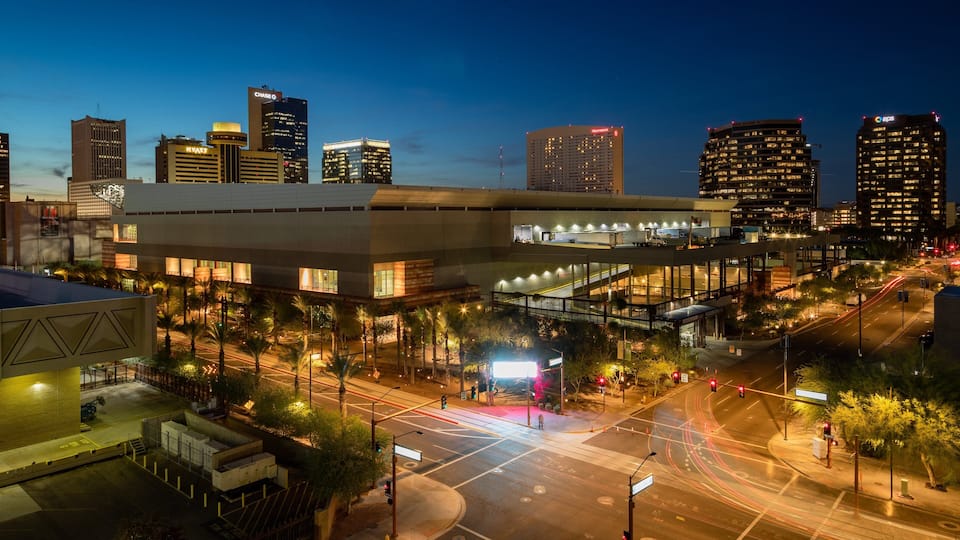 Midtown which includes a city and night scenes