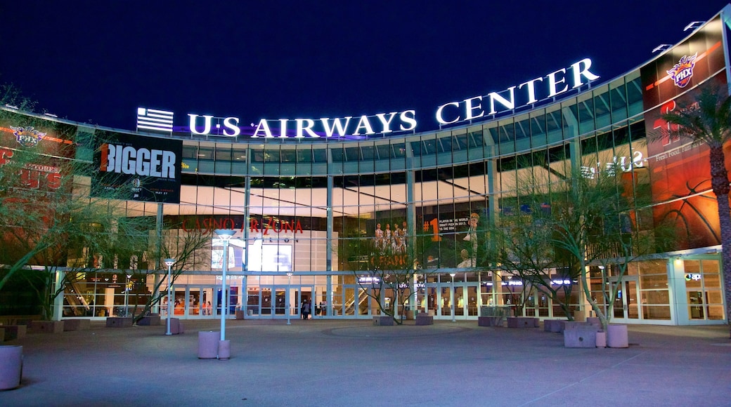 Downtown Phoenix showing signage and night scenes