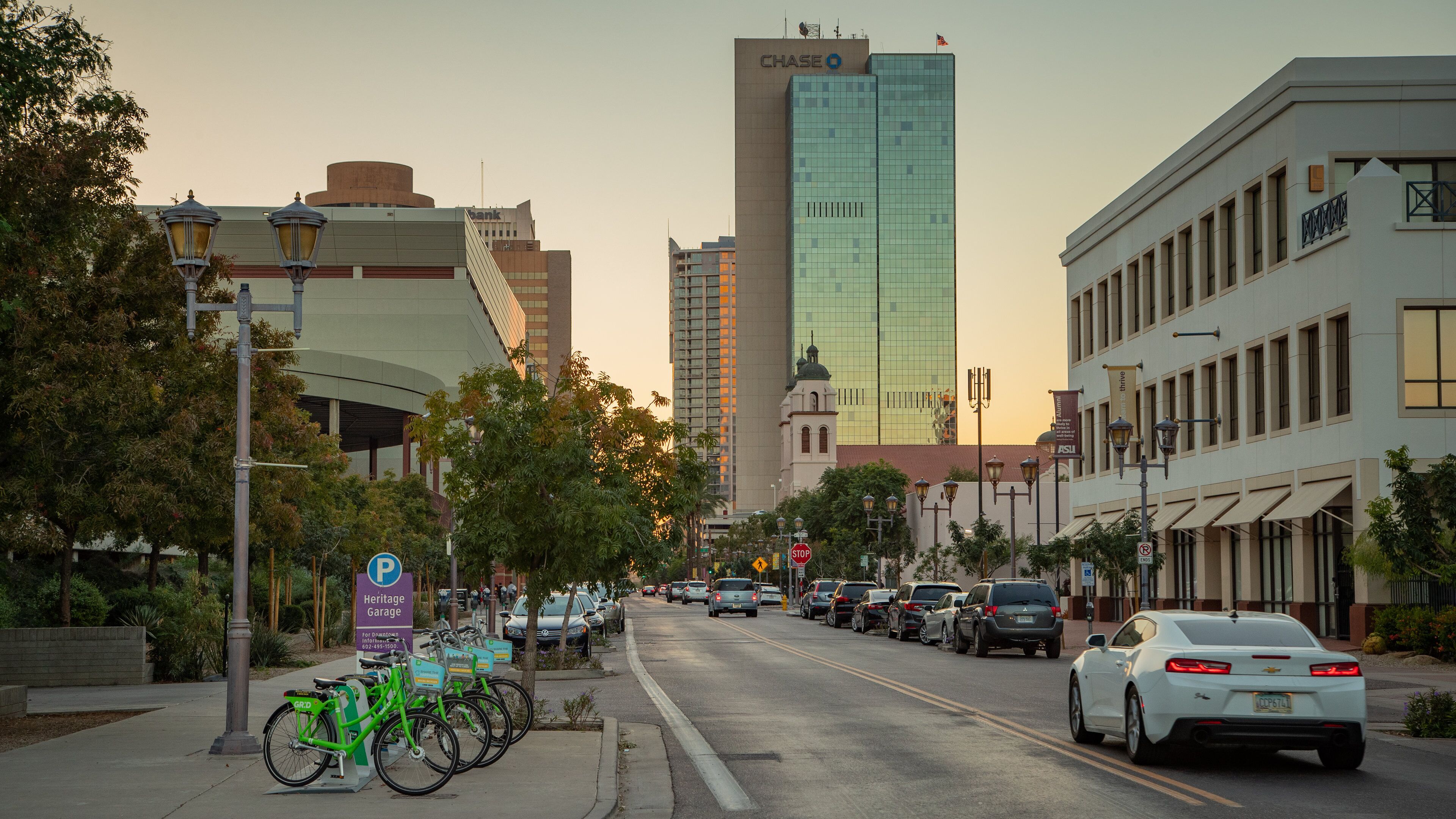 Downtown Phoenix showing a city and a sunset