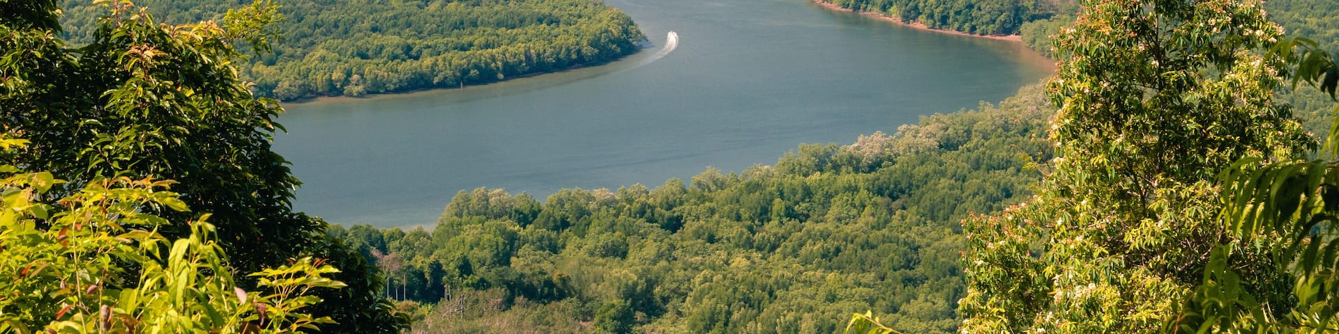 Aerial view on tropical landscape with Kra Buri river and mountains on horizon at Ranong province of Thailand. Khao Fa Chi viewpoint.