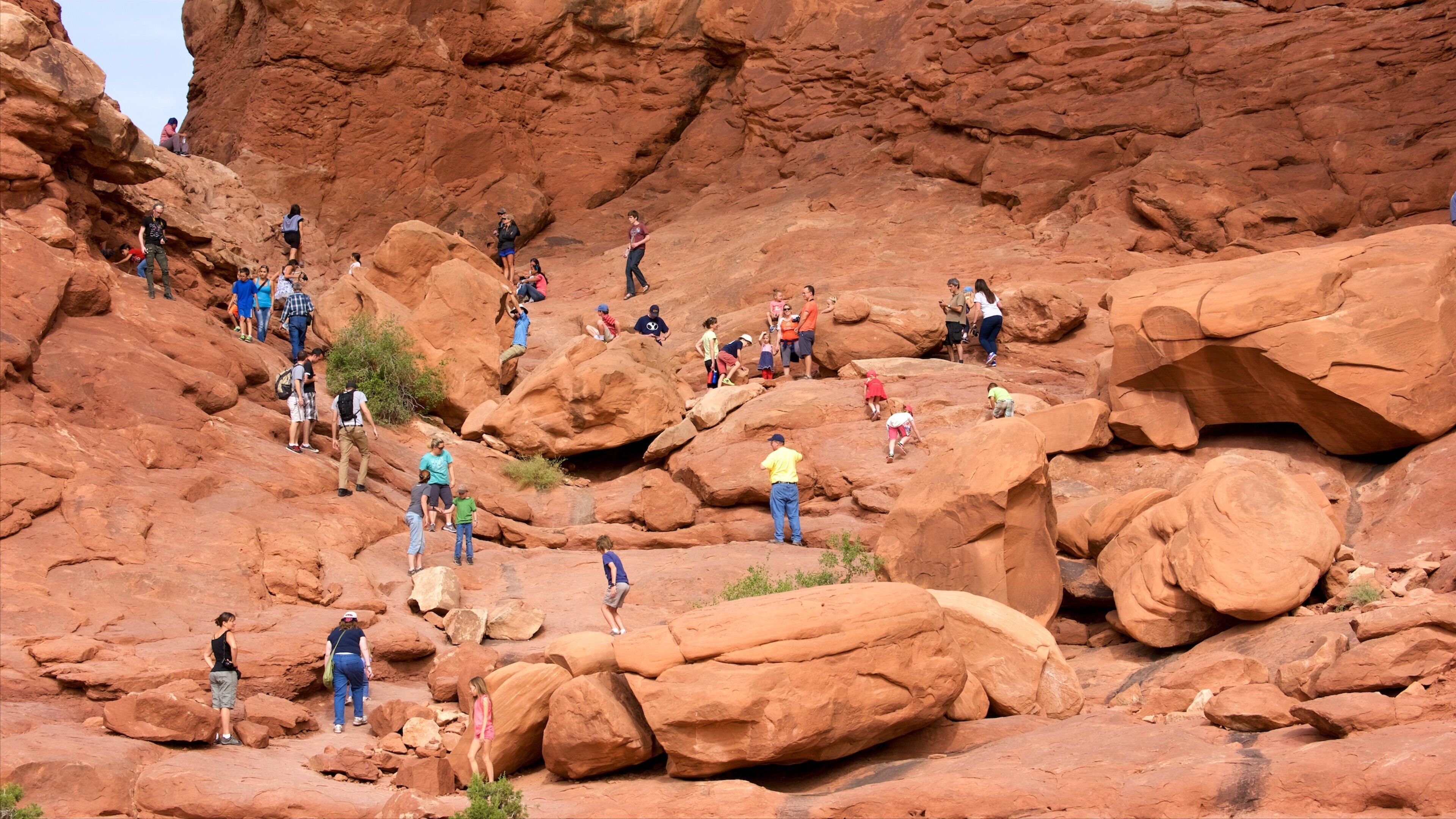 Double Arch which includes hiking or walking, mountains and tranquil scenes