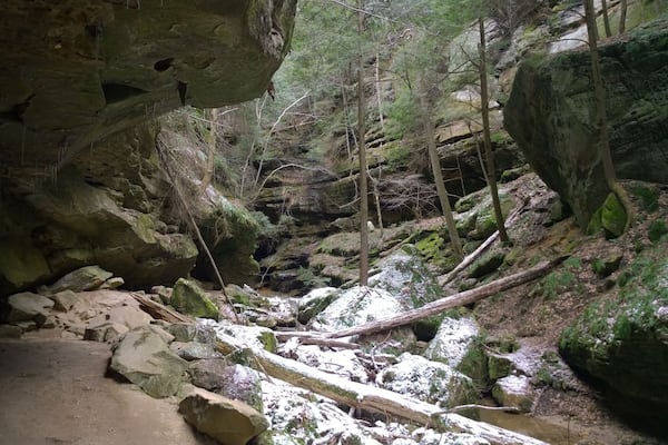 Conkles Hollow is a state nature preserve within the Hocking Hills region. Its sheer cliffs of Black Hand sandstone rise nearly 200 feet above the valley floor.
The deep, cool gorge, which is only 100 feet wide in places and is considered to be the deepest in Ohio, has numerous waterfalls cascading over its sandstone cliffs.
The lower trail through the gorge is about 1 mile and is accessible for the most casual of hikers. The rim trail is a couple miles long and is a bit more strenuous.