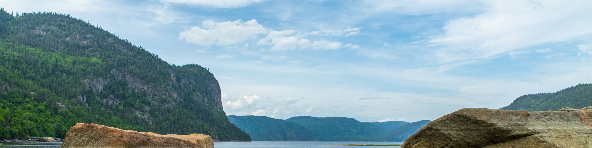 Parc National du Fjord-du-Saguenay featuring a lake or waterhole