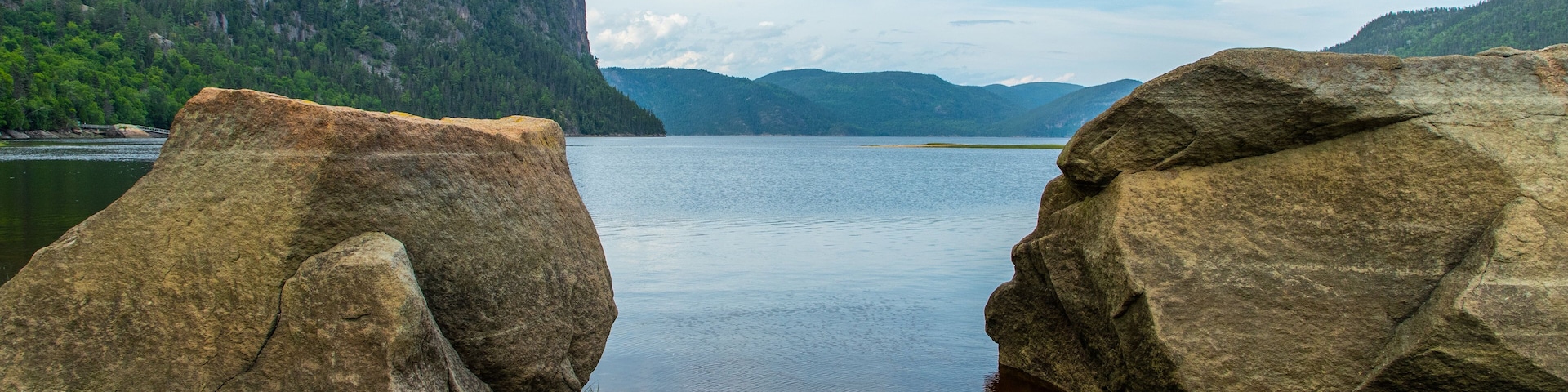 Parc National du Fjord-du-Saguenay featuring a lake or waterhole