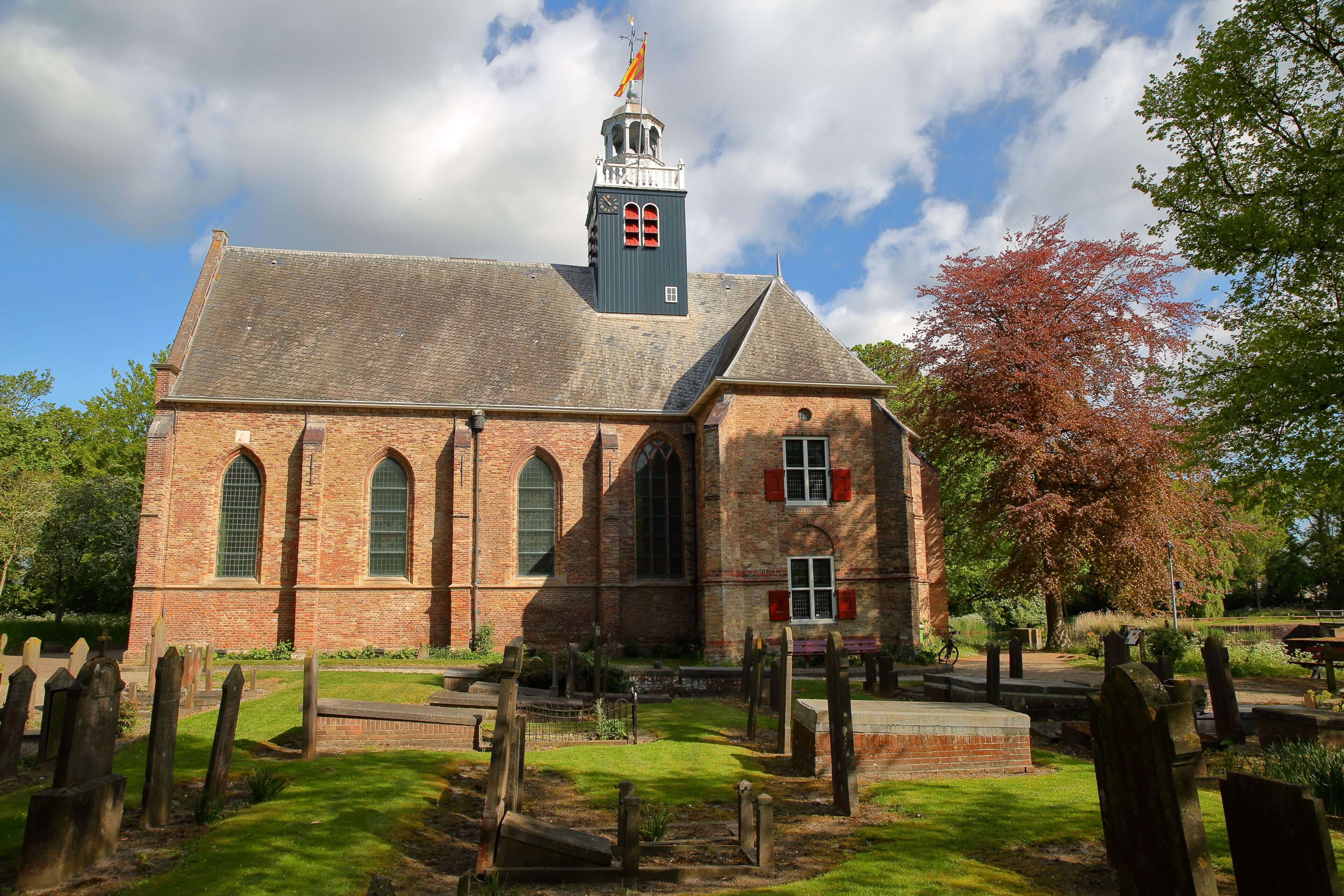The church Slotkapel in Egmond aan den Hoef, Bergen, Netherlands, surrounded by the cemetery and located close to the old Castle of Egmond