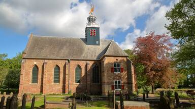 The church Slotkapel in Egmond aan den Hoef, Bergen, Netherlands, surrounded by the cemetery and located close to the old Castle of Egmond