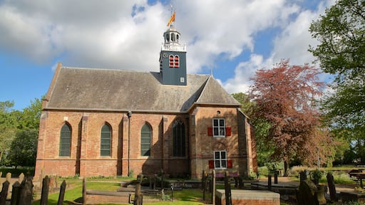 The church Slotkapel in Egmond aan den Hoef, Bergen, Netherlands, surrounded by the cemetery and located close to the old Castle of Egmond