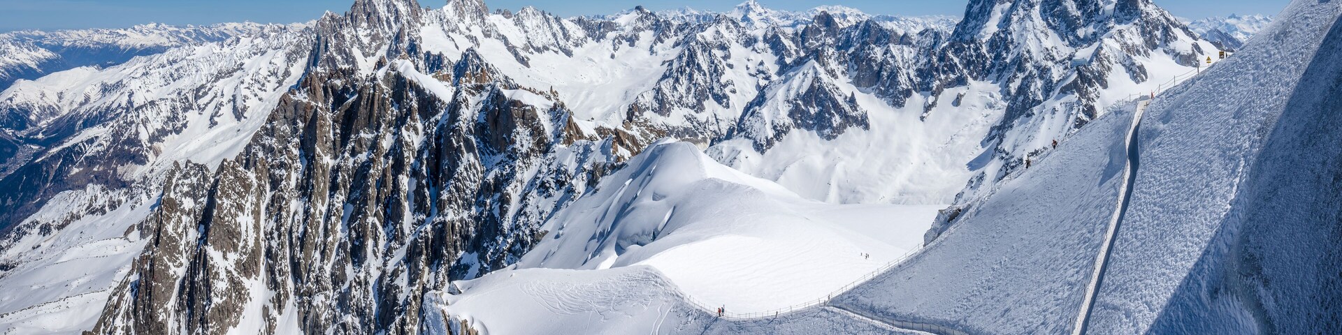 Mont-Blanc Mountain Range, Chamonix, Hautes-Savoie, Alps, France: Winter View from Aiguille du Midi near the Vallee Blanche ski resort, Les Grandes Jorasses (right) and Chamonix Needle (left)