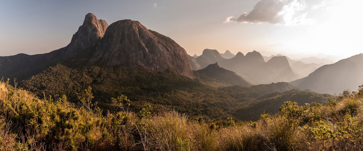 Beautiful view to big rocky peak and other mountains on the rainforest