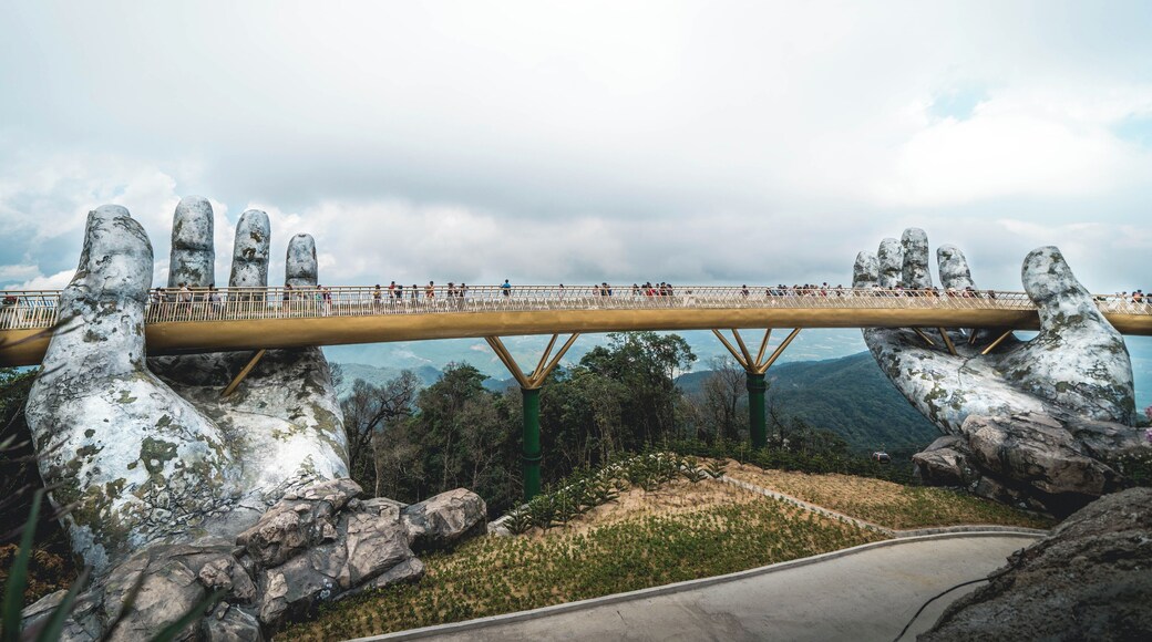 Nam Views | Da Nang: There is a reggae song by Bounty Killer feat. Junior Reid & Busta Rhymes called “Change Like the Weather”, looking at this image and comparing it to the first image I posted of the Golden Bridge I can’t help but hear that song playing in my mind. The skies were so blue! Picture perfect blue! Regardless though and even with the clouds taking over the sky, this bridge is still magnificent. Aptly nick named “The Hand of God”, when you look out at Da Nang from the arches of the Golden Bridge and regardless of your faith, you can’t help but appreciate the beautiful earth our creator has given us. Just look around and you will see everything that we need is all right here, conveniently place on this earth just for us. What a perfect world! Thanks again @vany_do262 for your suggestion!
.
If you like this photo go ahead and hit that like and if you love it show my page some support with a follow. Much appreciation and thanks in advance! 🙏🏾
.
.
.
.
#sonyalpha #sonya7riii #traveljunkie #nomadlife #travelpictures #travelmemories #travelgram #wandering #wanderer #instatrip #instatravel #natgeoyourshot #lpfanphoto #troveon #travelsoutheastasia #explorevietnam #southeastasia #vietnam #danang #visitvietnam #beautifulseasia #igvietnam #vietnamcharm #vscovietnam #banahills #sunworld #themepark #bridges #bridgeview #blueplanet