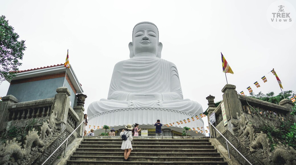 Nam Views | Da Nang: Images of Buddha can be seen sitting or standing in various poses. One may think that any given pose may just just be one of aesthetics, focused on how the Buddha fits into any given environment. That is somewhat true however it’s not about the aesthetics but about what feeling the Buddha adds to a particular space and gives it’s onlookers. These traditional poses are related to important events in the life or past lives of the historical Buddha. There are over 100 poses referred to as an asana or an attitude, these are accompanied by specific hand gestures called a mudra.
.
The pose of the Buddha at Sun World Ba Na Hills is among one of the most commonly seen Buddha poses. It depicts the Buddha in a double lotus pose with ankles tucked behind each other and both hands in the lap faced up. This pose is known as the Meditation/Serenity/ or Calming Buddha. Buddhist devotes will look towards this Buddha pose when seeking peace or calm in their lives. People who meditate at home will often use this image of Buddha when setting up a serenity room or a place in a corner of their home as a place where they can sit and relax for a bit.
.
Or daily lives can be hectic and we can easily find ourselves going through the day without taking any time to just sit and relax for a moment. My challenge to anyone reading this, if possible, is to stop whatever it is you’re doing and sit and do nothing for at least 2 minutes. Take a moment clear your head, turn on some calming music if necessary, you will be surprised how much better you feel when you take a mental break from everything, even if it’s just for a moment.
.
.
.
.
#sonyalpha #sonya7riii #traveladdict #solotravel #travelpics #travelersnotebook #travelgram #wandering #wanderer #instatrip #instatravel #natgeoyourshot #lpfanphoto #troveon #travelsoutheastasia #explorevietnam #southeastasia #vietnam #danang #visitvietnam #beautifulseasia #igvietnam #vietnamcharm #vscovietnam #banahills #sunworld #buddha #buddhism #bigbuddha #spirituality