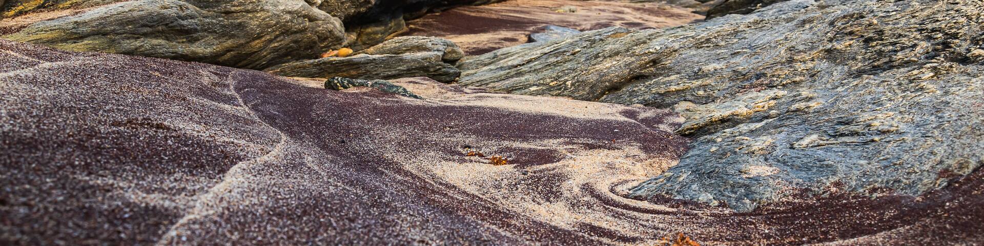 Africa beach mixed with black sand and lighter sand from the natural vegetation of the time, photo taken in Accra Ghana West Africa