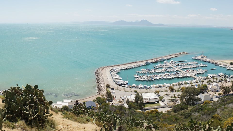 Marina with boats and yachts in the old part of Sidi Bou Said village in Carthage, Tunisia.