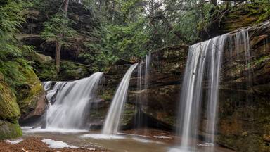 Hidden in the Hocking Hills - Hidden Falls is a waterfall in the Hocking Hills of Ohio that is partially obscured by a huge boulder and only flows well after heavy rains.