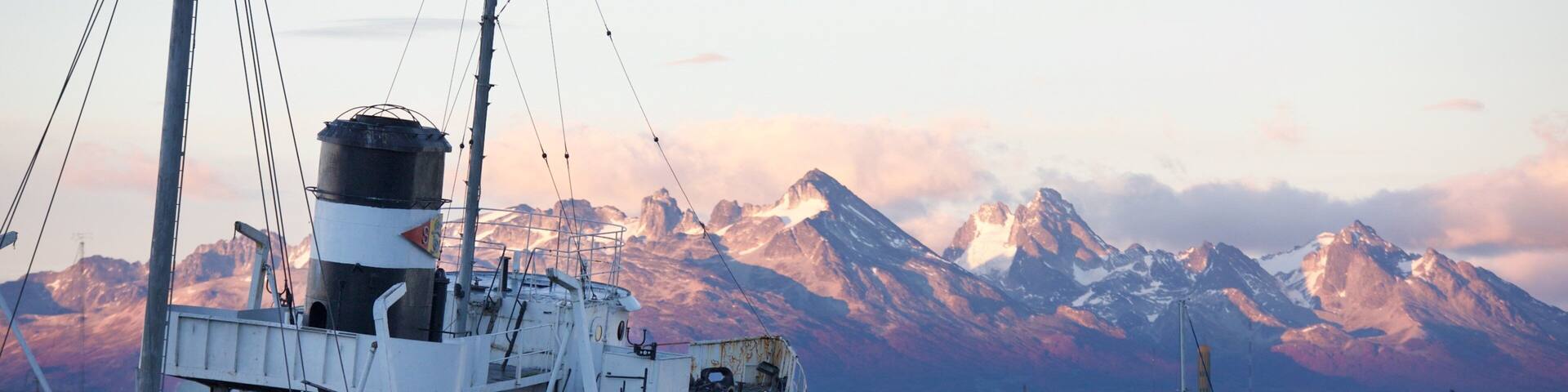 St. Christopher Shipwreck showing a sunset and a bay or harbor