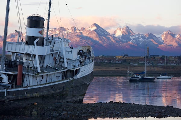 St. Christopher Shipwreck showing a sunset and a bay or harbor