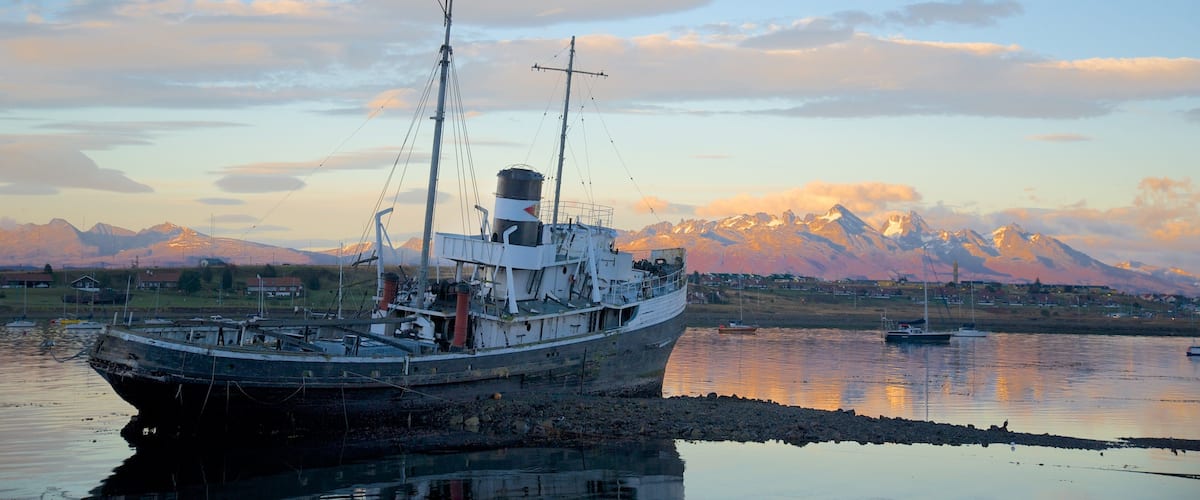 St. Christopher Shipwreck featuring a bay or harbor and a sunset