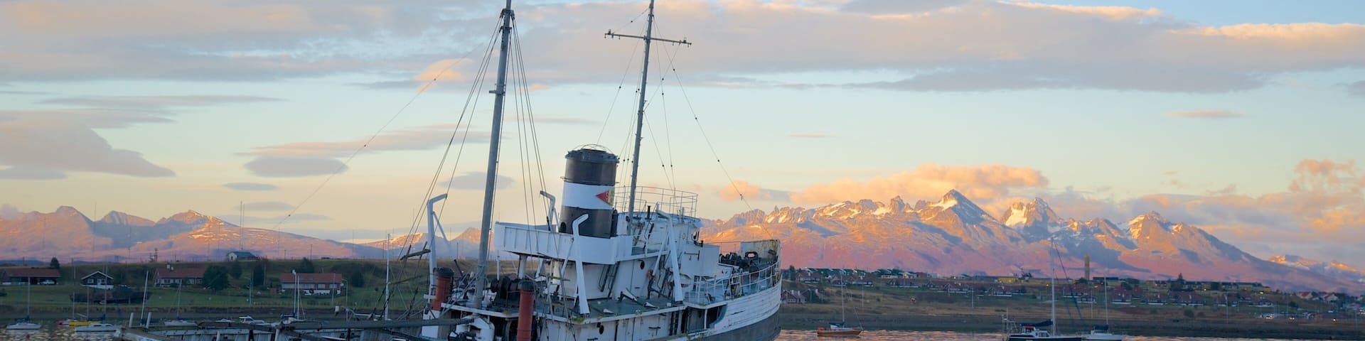 St. Christopher Shipwreck featuring a bay or harbor and a sunset