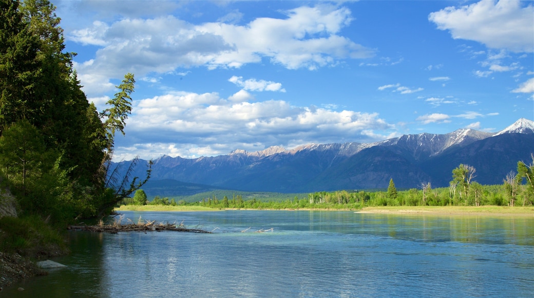 Skookumchuck which includes a lake or waterhole, mountains and tranquil scenes
