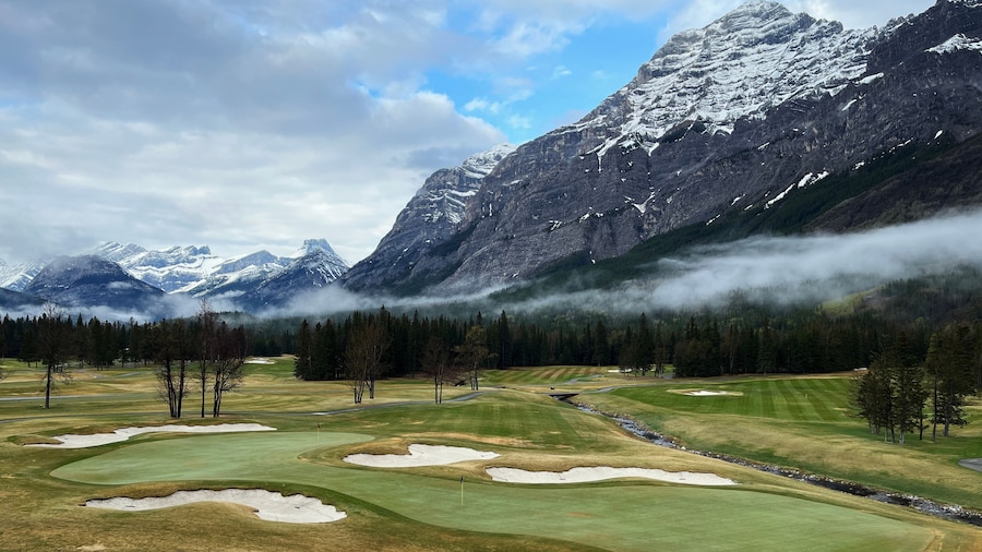 A golf course in the mountains.